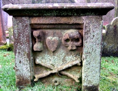 Memento Mori Carvings on Tomb